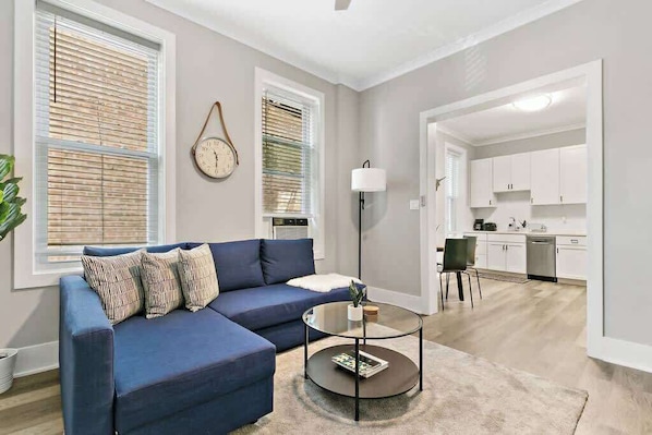 The place opens from the kitchen then flows into the living room