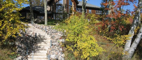 Lakeside stairway to house.