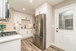 Kitchen with appliances and everything you need for entertaining. 