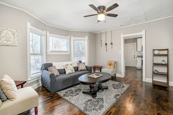 Living area with ample seating and pull-out couch (sleeps two).