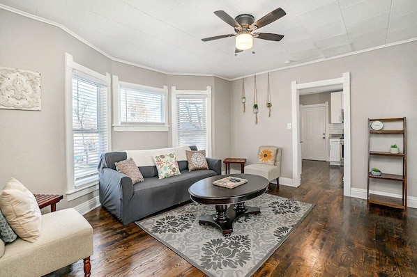 Living area with ample seating and pull-out couch (sleeps two).