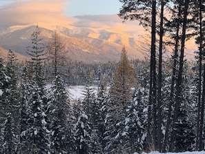 View of Swan Mountain Range and Echo Lake from cabin porch