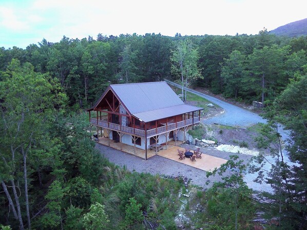 Spacious mountain retreat on 10 acres w/ full wrap-around porch & fire pit area