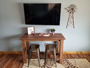 large television & additional seating in the living area