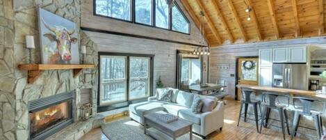 Gorgeous open living room, dining space, and kitchen