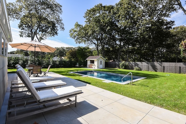 Relax by the new saltwater gunite pool with a cool summer lunch or hot barbeque!