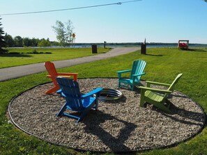 OVERALL:  The very cute bonfire ring with Manistee Lake in the background (across the road).