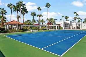 Tennis court with pickleball net
