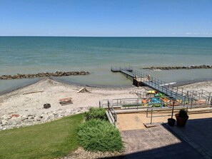 View of Lake Erie beach from private balcony (private beach access for condo guests and owners only)
