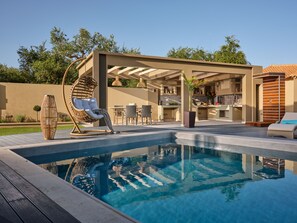 Featuring high quality sun-beds & umbrellas. 