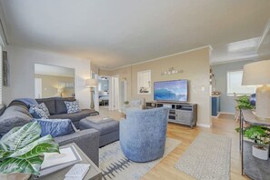 Living room: This sunny room offers seating for the whole family.