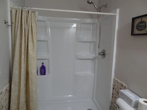 Mainfloor bathroom. Walk in shower with adjustable shower head.