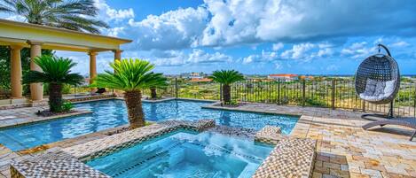 Large Pool with a picturesque view