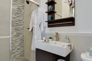 Large glass shower and spa like feel bathroom