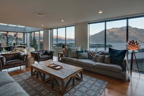 Enjoy Queenstown's charm with nearby dining and amenities, while still enjoying peace away from the city noise caption using - NZ luxury lodges