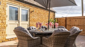 Patio area with seating, Poplar House, Bolthole Retreats