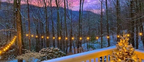 Snowy sunset view from the deck/patio area.