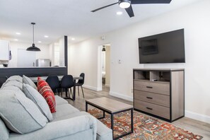 Spacious living room featuring a Queen sleeper sofa