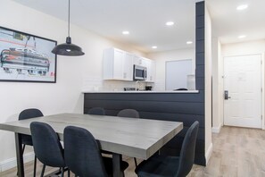 Full kitchen with dining table