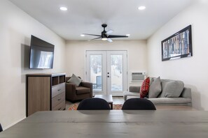 Spacious living room featuring a Queen sleeper sofa