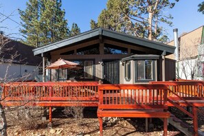 Front house entrance and patio deck.