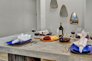 Enjoy a glass of Texas wine with a savory charcuterie board