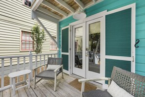 OPEN AIR FRONT PORCH W/SEATING FOR TWO