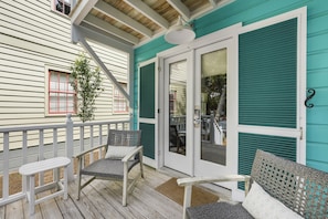 OPEN AIR FRONT PORCH W/SEATING FOR TWO