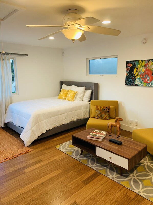 Queen Bed and Two Futon Sofa Chairs that completely recline to twin beds. 