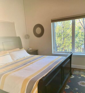 Comfy King bed. Room darkening window shades.