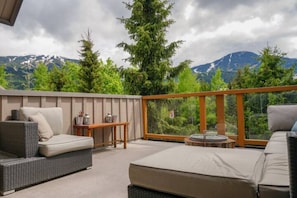 Upstairs patio with summer views to Whistler and Blackcomb mountains 