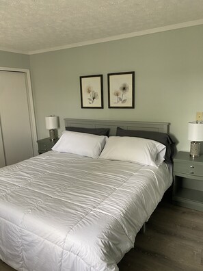 Bedroom one with king bed
