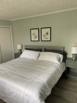 Bedroom one with king bed
