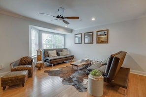 Lovely living room area, both futons fold out to full size sleepers.