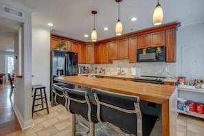 Serve up the coffee and breakfast at the kitchen island.