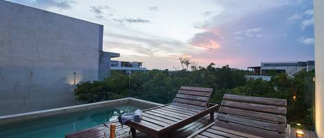 Enjoy a spectacular sunset on this incredible terrace.