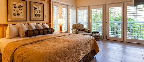 Primary bedroom features a king size bed.