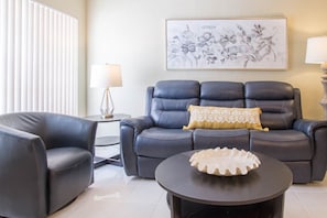 The leather couch includes 2 recliners on either end!