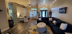 living room with 12 ft ceilings