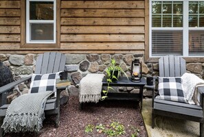 Relax out front in the Adirondack chairs. 