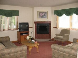 Cozy Living Room With Gas Fireplace.