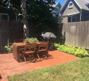 Outdoor grill and dining with room for a couple of friends!