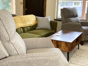 Living Room—Two recliners are perfect for lounging in front of the fireplace.