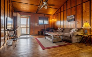 Open living room, dining area and kitchen