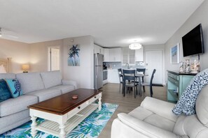 The studio space is efficiently designed with an open living, dining, bedroom and kitchen space, in addition to a full bathroom and walk-in closet