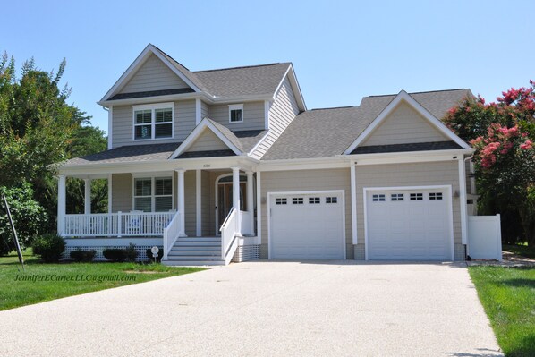 Garage will accommodate 2 cars; 4 Cars in driveway. 