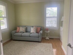 Den w/Queen Sleeper Sofa.  Powder room is just outside of Den. 
