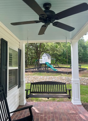A cooling fan breeze while enjoying the porch swing. 