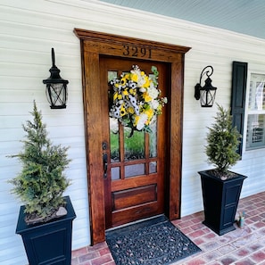 A stately front entry door that greets each and every guest. 