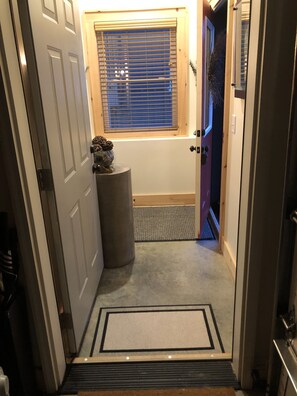 Entry into the cottage from attached garage